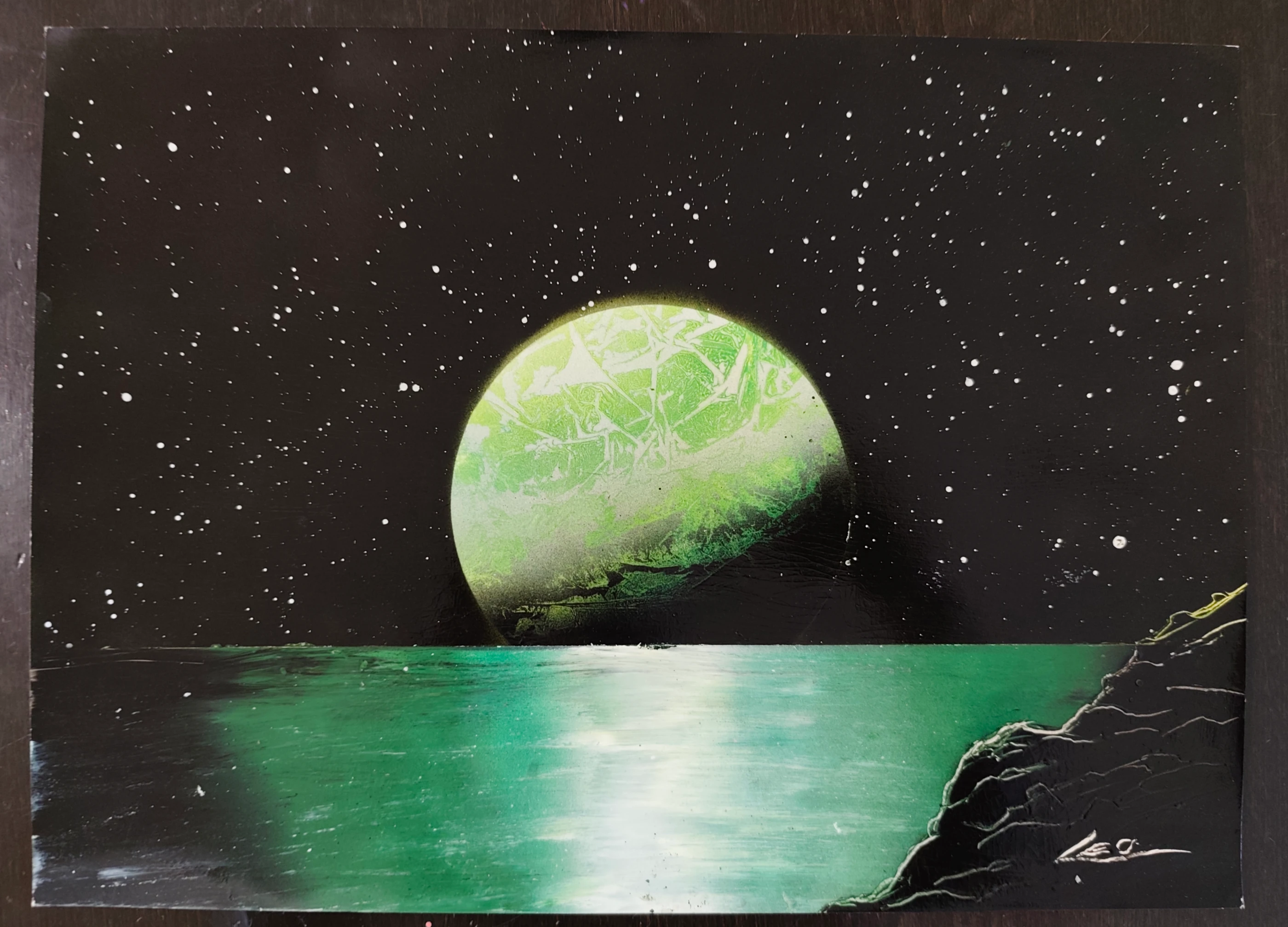 Green planet on the horizon